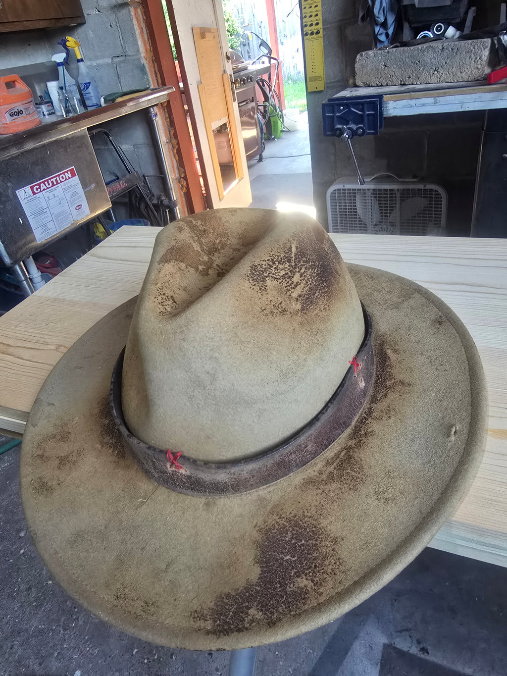 Distressed cowboy hat.