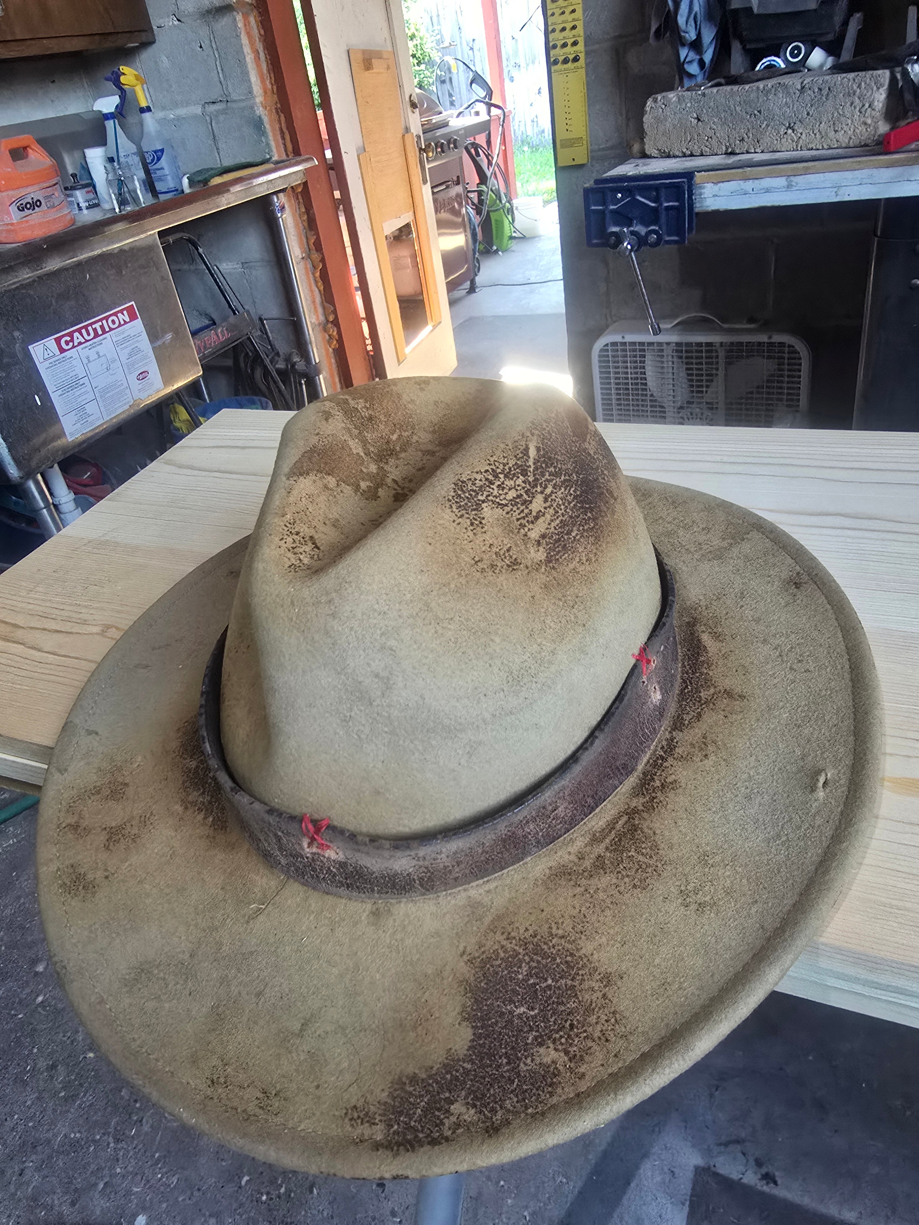 Distressed cowboy hat.